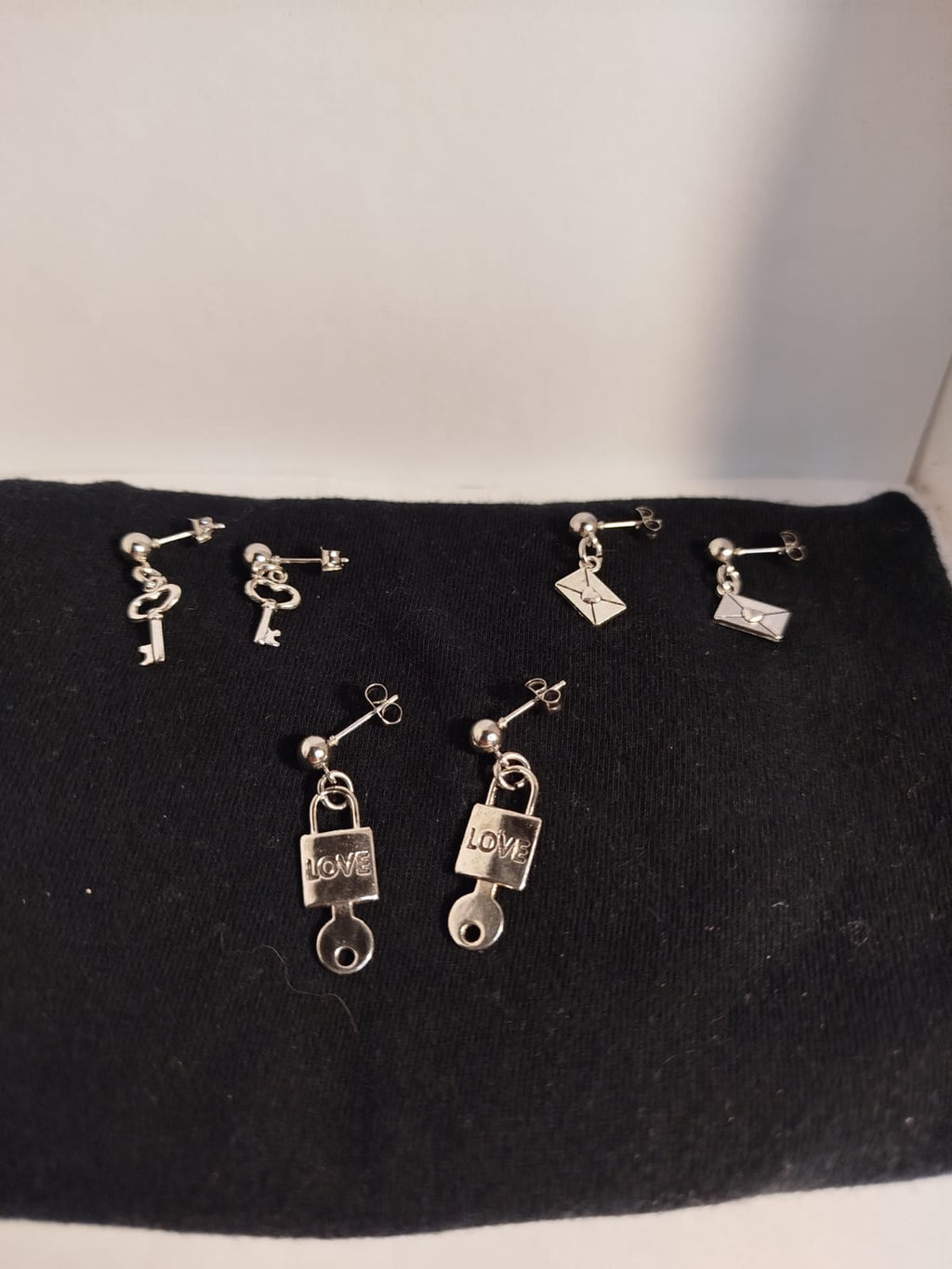 Pendientes Plateados con diferentes dijes