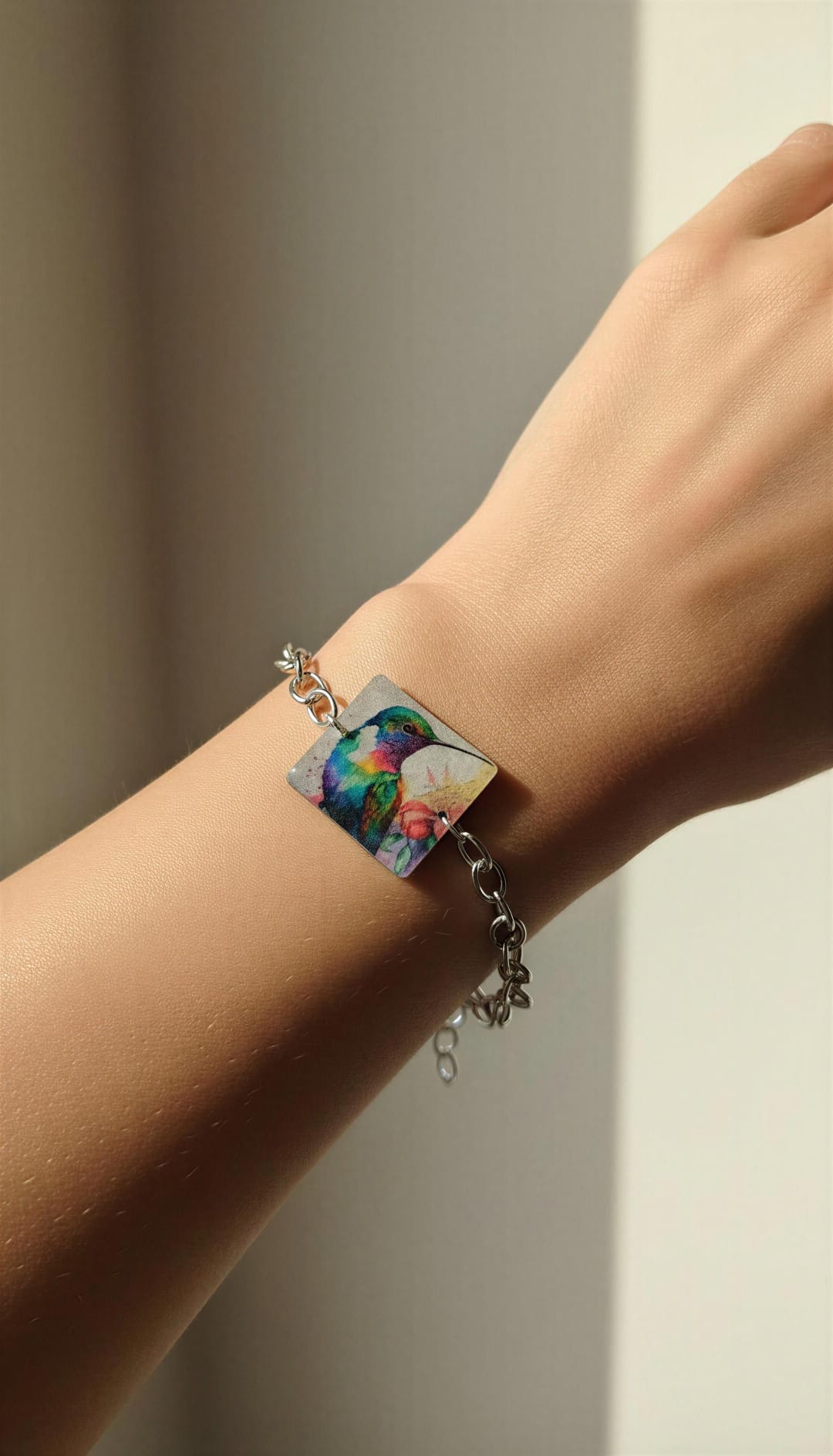 Pulsera colibrí y cadena acero.