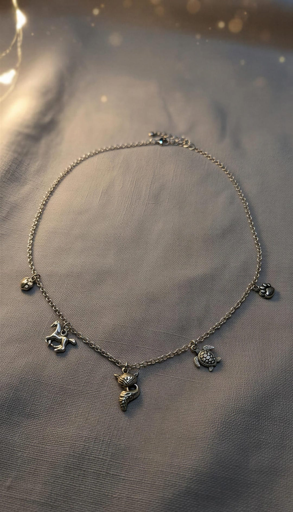 Collar Acero plateado con dijes motivos de animales