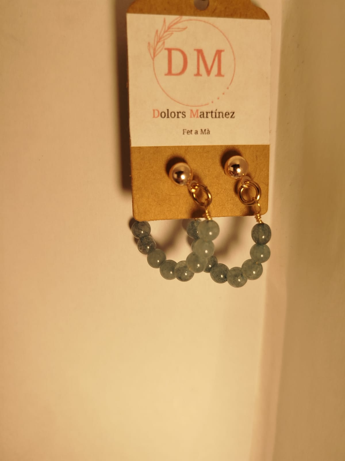 Pendientes dorados con piedra jade