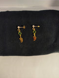 Pendientes piececitos dorados
